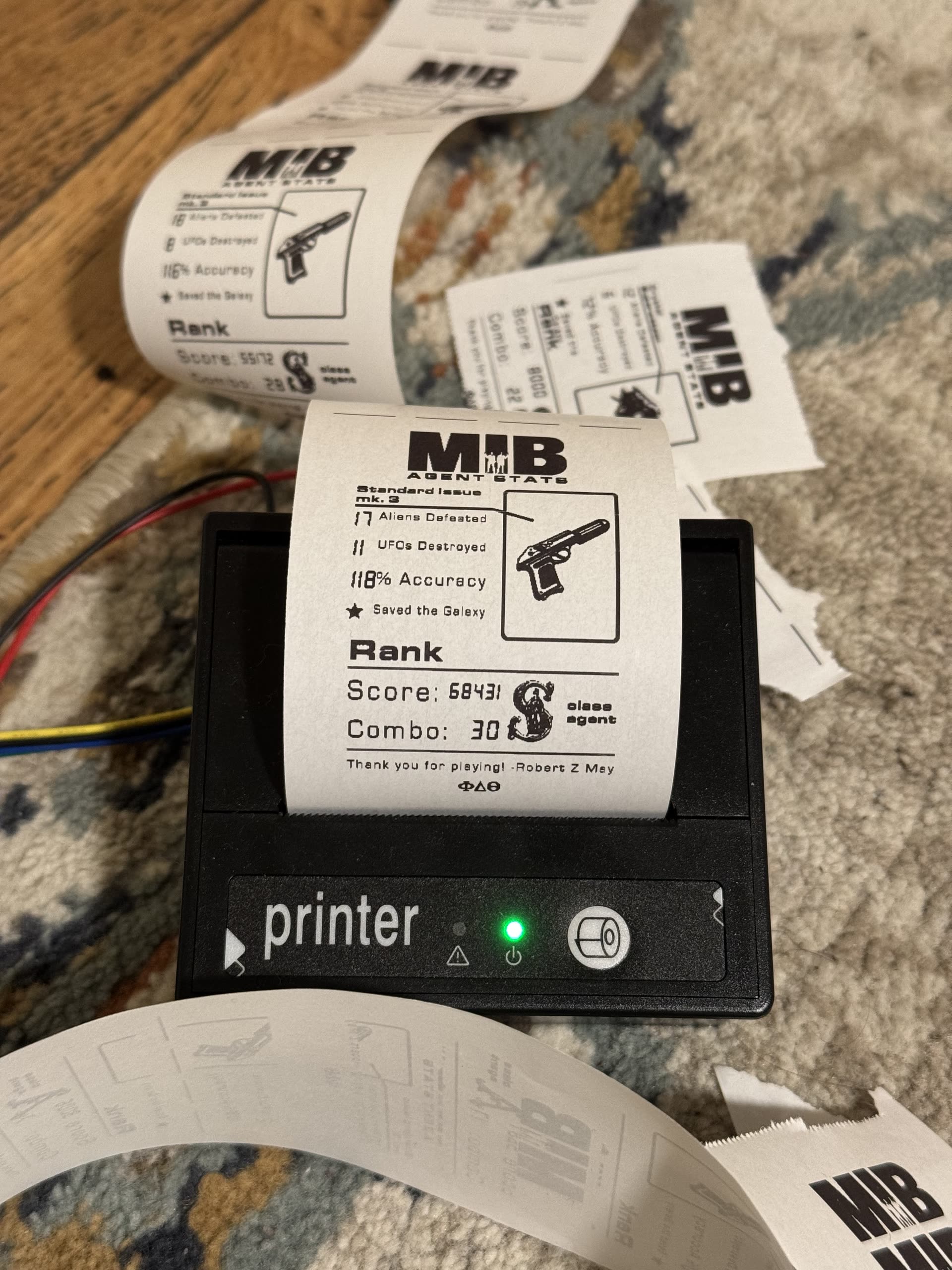 Thermal printer integration for player stat printouts.